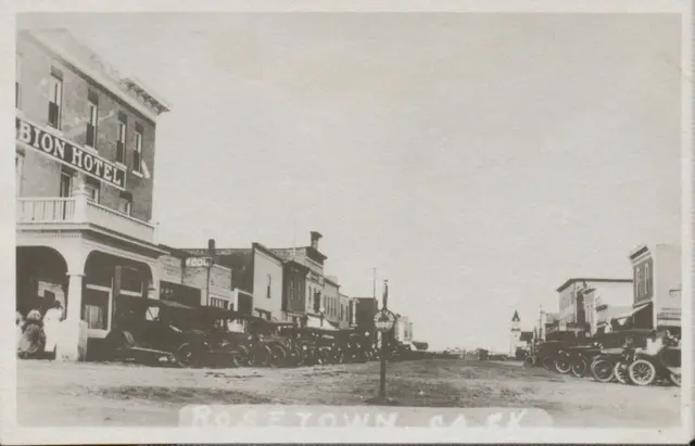 Main Street with the Albion Hotel and parked cars